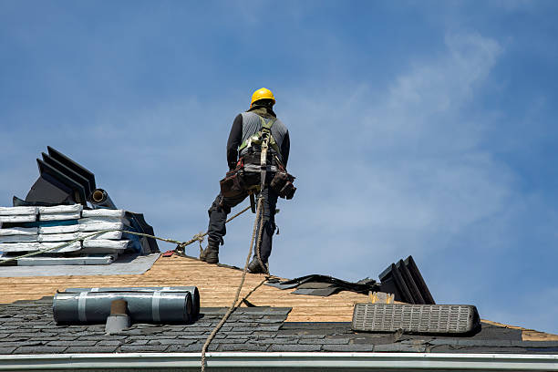 Professional Roofing technician working in Foster, OK